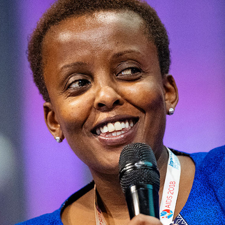 Portrait photo of Nduku Kilonzo speaking with a microphone