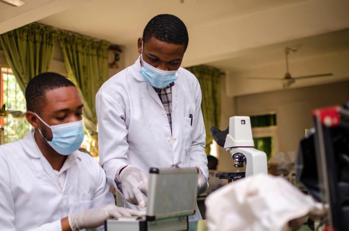 Two African scientists working in a lab